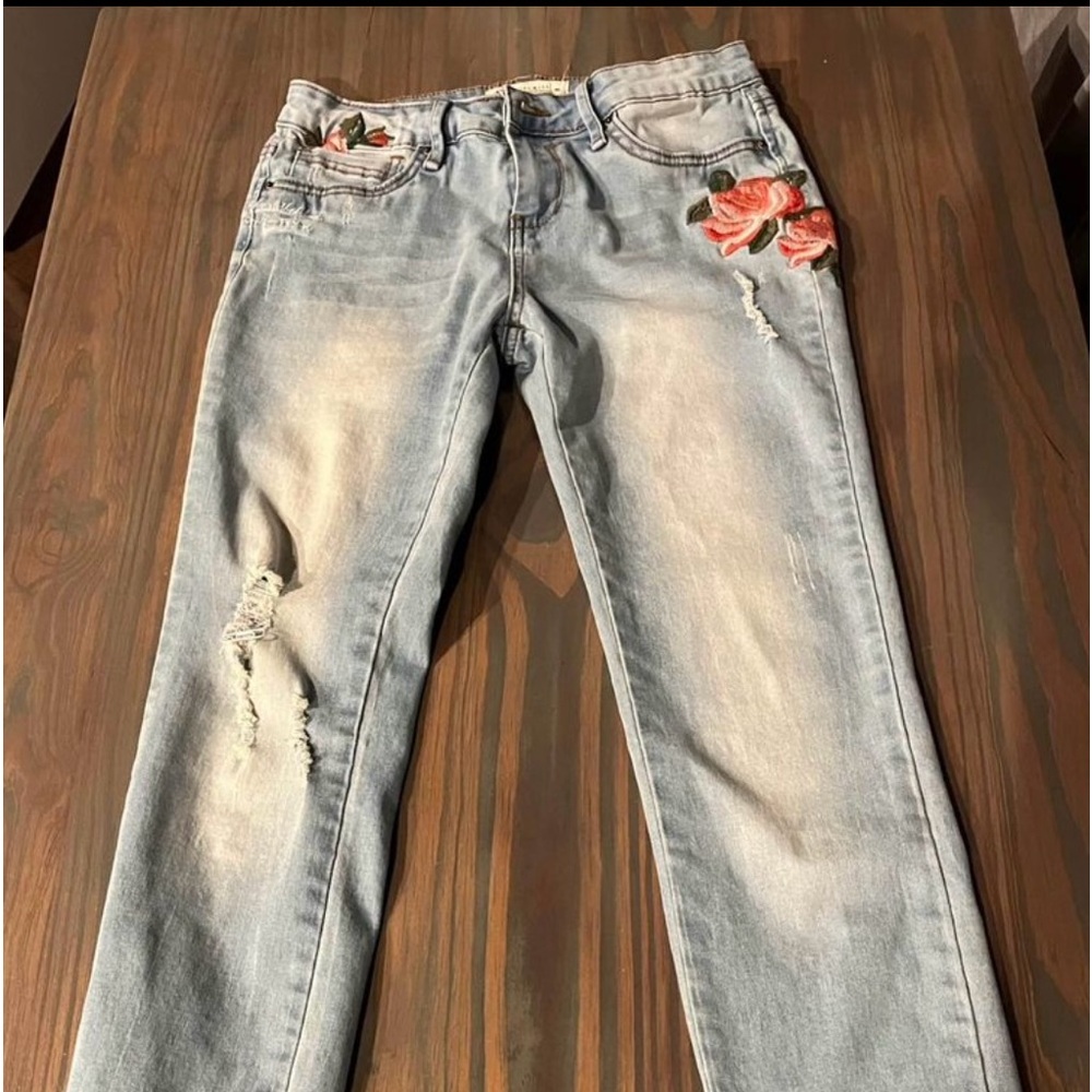 Designer embroidered light denim jeans